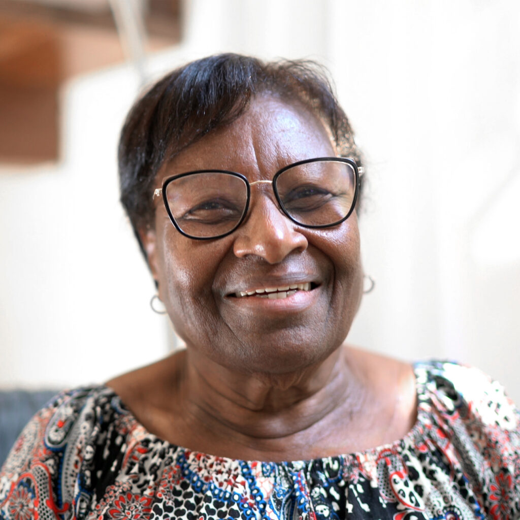 older African American woman wearing glasses